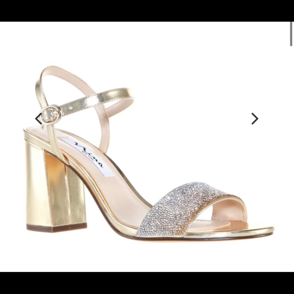 Beautiful Platinum/Gold Nina shoes size 9.